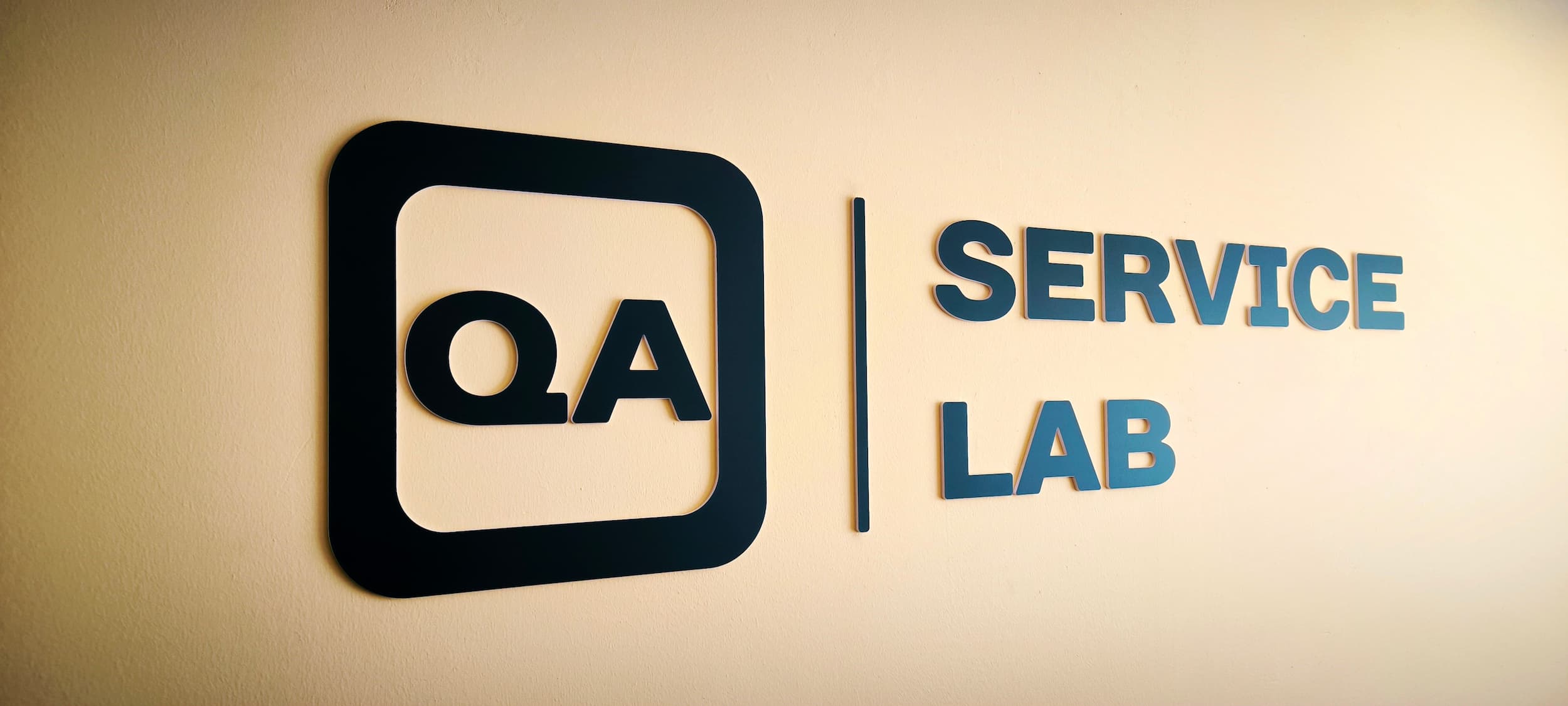 QA Service Lab office logo